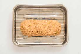To minimize cracking, smooth the top of the loaf by rubbing in a little cold water before baking. The 7 Secrets To A Perfectly Moist Meatloaf