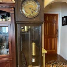 The Grandfather Clock Repair Specialist
