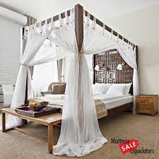 canopy bed with an orange county mattress