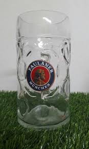 lit dimpled glass beer mug with handle
