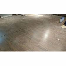 glossy brown pergo wooden flooring for