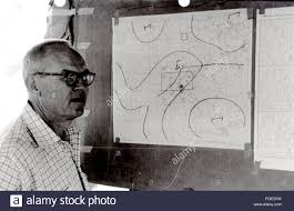 Man Examines National Weather Service Wind Charts 1961 Stock