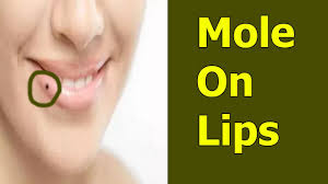 mole on lips astrology in urdu til on