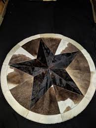 cow hide round rugs
