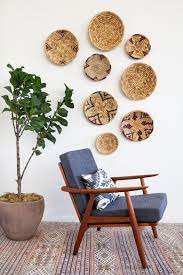woven baskets and plates as wall decor