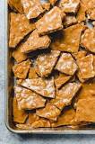 Why do you put baking soda in peanut brittle?