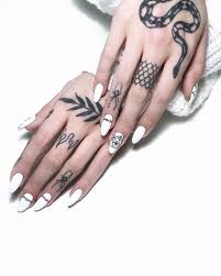 A common snake tattoo from the past is one of the snake god swallowing its tail. Small Spider Tattoo On Fingers By Elvira Savchuk Finger Tattoos Finger Tattoo Designs Knuckle Tattoos