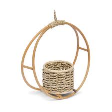 Hanging three tier woven wicker baskets each basket is also tiered in size from small to larger. Barbara Rattan Hanging Planters The Woven House