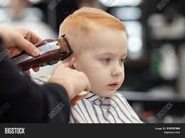 Kids hair salons directory provide links and review to special kids friendly hair salons where children are entertained with computer games, stories, books, and songs. Cute Ginger Baby Boy Image Photo Free Trial Bigstock