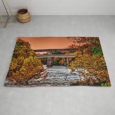 autumn river crossing rug by scott