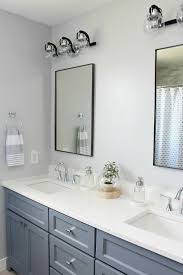 Double sink bathroom vanity cabinets are often mounted one above the other with space left for towels (and bottle traps) between. Coastal Style Bathroom Makeover Clean And Scentsible