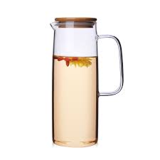 glass juice and iced tea pitcher with
