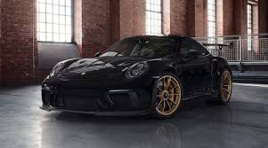 He has every porsche model you could imagine, from a 356 to a 911 r. Porsche Exclusive 911 Gt3 Rs Is A Black And Gold Gem