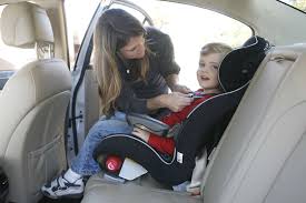 child in a forward facing car seat