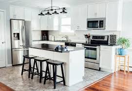 white kitchen cabinets with dark