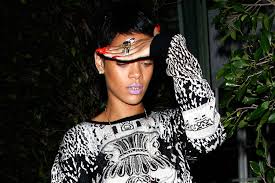 Not just any woman though, not controversial enough. Rihanna Responds To Chris Brown S Controversial Tattoo By Sporting A Metal Teeth Grill
