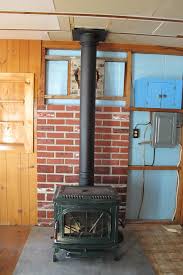 Wood Stove Wall Shield With River Rock