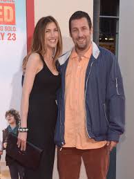 But the odd attire does nothing to flatter his burly frame. 16 Times Adam Sandler Looked Like He Got Dressed In The Dark