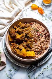 caribbean curry goat with rice and peas