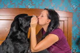 Girl making out with dog