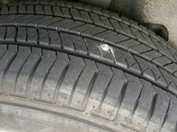 can you drive with a nail in your tire