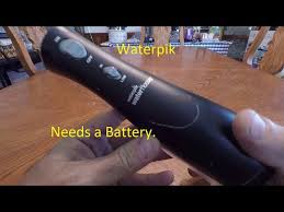 the battery in a waterpik water flosser