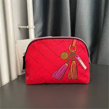 estee lauder red canvas tel pattern