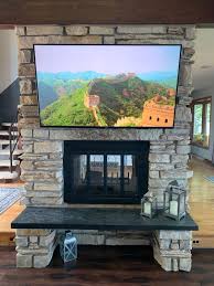 Tv Mounted Brick Fireplace