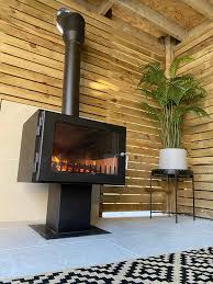 Wood Stove In Log Cabin Or Summerhouse