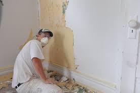 remove wallpaper and wash down walls