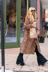 Winter Outfit Includes A Leopard Coat