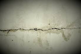 how to repair s on concrete floor