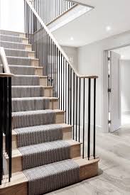 I like the white contrast with the grey carpet. Custom Railings Metal Stairs Fabrication Modern Railings Custom Stairs Chicago Modern Staircase Design Modern Staircase House Stairs Staircase Design