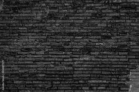 Old Black Brick Wall Texture Background