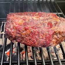 cooking chuck roast on a charcoal grill