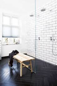 11 bathrooms with black herringbone tiles