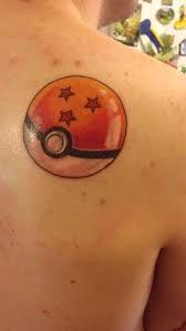 This black inked dragon has red eyes and red fire coming out of his mouth. Since Everyone Is Sharing Their Pokemon Tattoos Here S My Pokemon X Dragonball Tattoo Pokemon