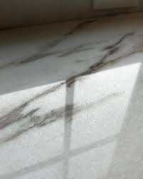 how to remove scratches from marble