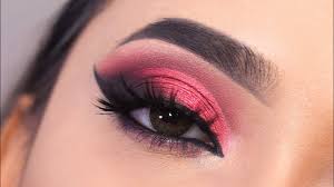red smokey eye makeup with winged