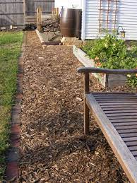 Wood Chip Path And A Raised Garden