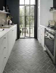 Are you asking for trouble? fifty years ago, most homeowners frowned upon hardwood as a flooring choice for a kitchen. 7 Scandinavian Kitchen Floor Tile Ideas That Ll Inspire You To Embrace Both Color And Pattern Hunker Kitchen Flooring Kitchen Floor Plans Kitchen Remodeling Projects