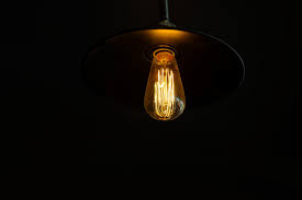 Retro Light Bulb Hanging With Dark Space Background For Your Decoration Concept Of Creativity Stock Photo Download Image Now Istock