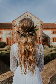 Classical smooth bun remains one of the most popular wedding hairstyles. 20 Hairstyles For Your Rustic Wedding Rustic Wedding Chic