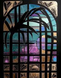 A Stained Glass Window With A Palm Tree