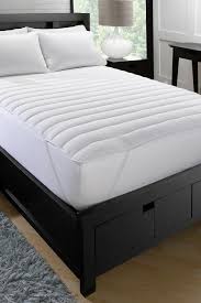 A traditional innerspring cal king firm mattress features wrapped coils with a layer of padding over them. Ella Jayne Home Big Soft Fiber Bed Cal King Mattress Pad 72 X84 Nordstrom Rack
