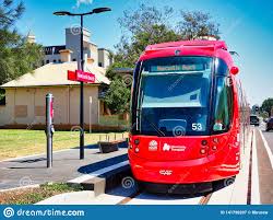 Red Tram At Newcastle Beach Lightrail Stop Australia