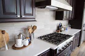 Another practical reason for doing this is that the countertop gets installed before the backsplash. Considering A Natural Stone Backsplash In The Kitchen Read This First Designed