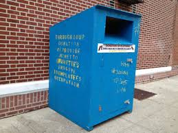 new sketchy clothing donation bin on