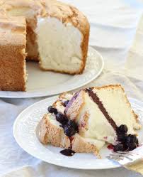This cake recipe makes an angel food cake with a hidden chocolate pudding filling. Angel Food Cake With Blueberry Sauce Chef Lindsey Farr