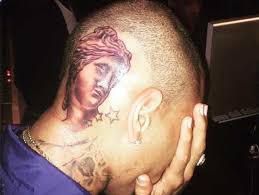 Chris brown is sporting a new neck tattoo: Chris Brown S New Tattoo